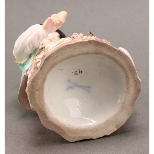 241 - A Meissen porcelain figure, of a boy feeding a dog, painted in polychrome, picked out with gilt, cir... 