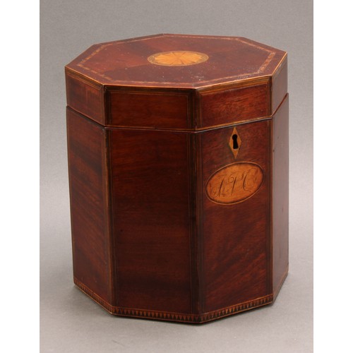 2329 - A George III mahogany and marquetry octagonal box or caddy, hinged cover inlaid with a batwing pater... 