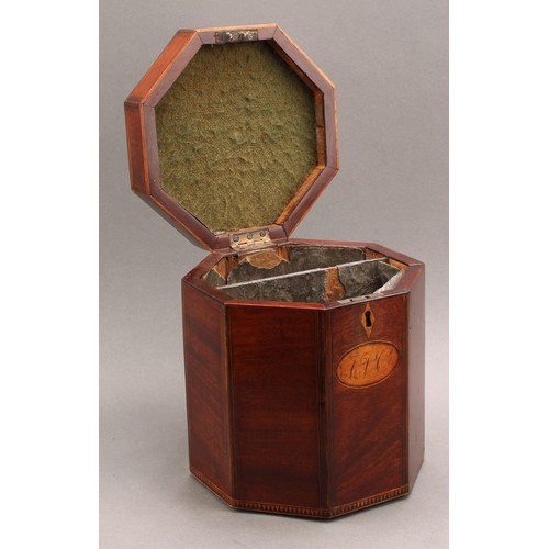 2329 - A George III mahogany and marquetry octagonal box or caddy, hinged cover inlaid with a batwing pater... 