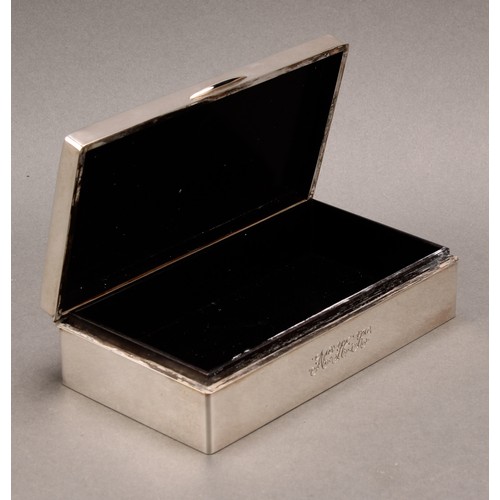 834 - A Japanese silver rectangular cigarette box, hinged cover engraved with blossoming prunus, 15.5cm wi... 