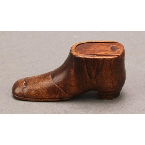 1414 - A 19th century novelty snuff box, as a shoe, sliding cover, brass pinwork to sole, 6.5cm long