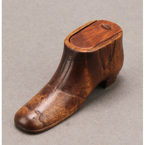 1414 - A 19th century novelty snuff box, as a shoe, sliding cover, brass pinwork to sole, 6.5cm long