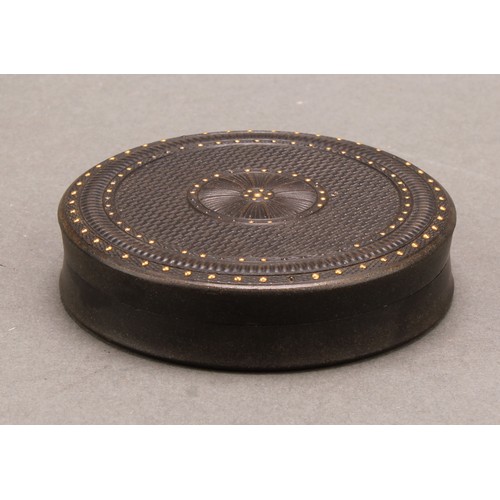 1415 - A 19th century pressed and engine turned bois durci waisted circular snuff box, push-fitting cover d... 