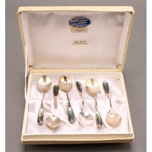 664 - A set of six New Zealand silver and paua shell coffee spoons, marked Silver, cased