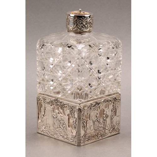 1011 - An early 20th century silver mounted hobnail-cut square dressing table scent bottle, the sleeve pier... 