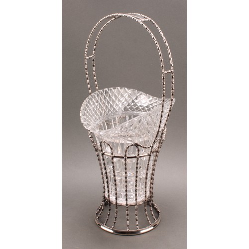 702 - An early 20th century E.P.N.S vase-form flower vase, bead-and-reel borders, hobnail-cut glass liner,... 