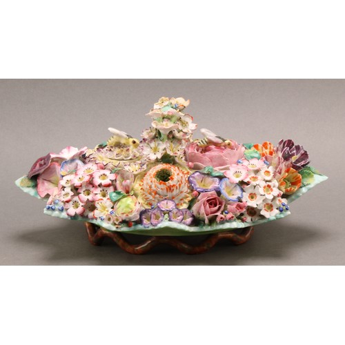 242 - A Meissen porcelain standish, profusely encrusted in colourful flowers and foliage, in the manner of... 