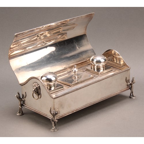 703 - An Edwardian E.P on copper treasury inkstand, hinged serpentine cover enclosing wells and a wafer bo... 