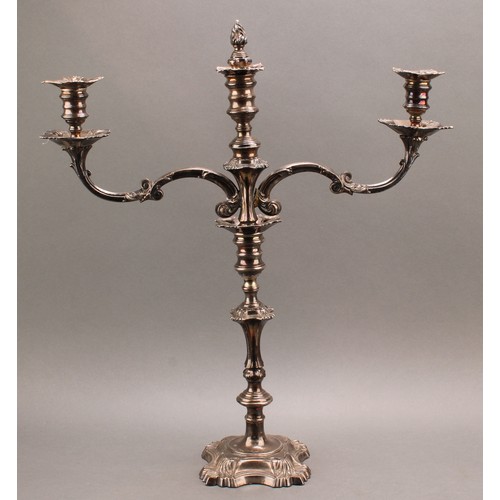 684 - A pair of William IV Old Sheffield Plate three-light table candelabra, campana sconces, knopped pill... 