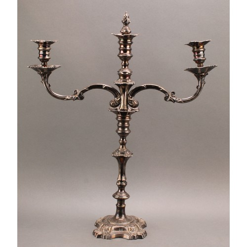 684 - A pair of William IV Old Sheffield Plate three-light table candelabra, campana sconces, knopped pill... 