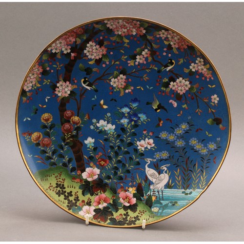 1317 - A Chinese cloisonné enamel circular dish, decorated with a pair of cranes among garden birds and blo... 