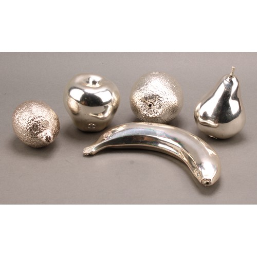 705 - Interior Decoration - a collection of silvered metal table decorations, as fruit, the banana 19cm lo... 