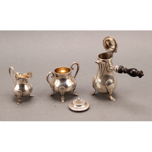 748 - A French silver miniature toy coffee service, comprising side-handled poit, cream jug and sucrier, o... 