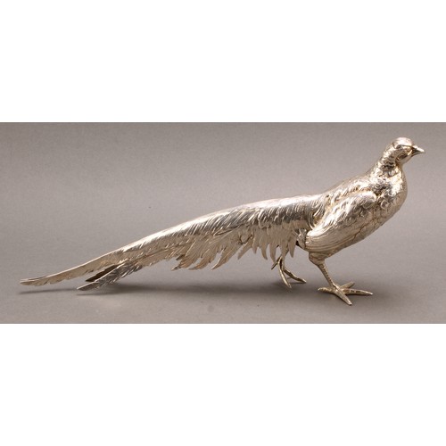 839 - A large Continental silver novelty table decoration, cast as a pheasant, 32cm long, marked Silver, 4... 