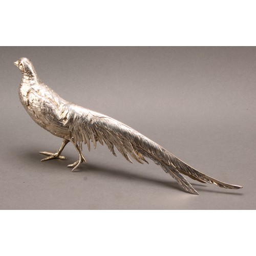 839 - A large Continental silver novelty table decoration, cast as a pheasant, 32cm long, marked Silver, 4... 