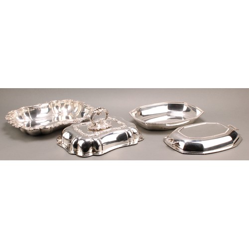 699 - A Victorian silver plated incurved shaped rectangular entree dish and cover, leafy scroll handle, le... 