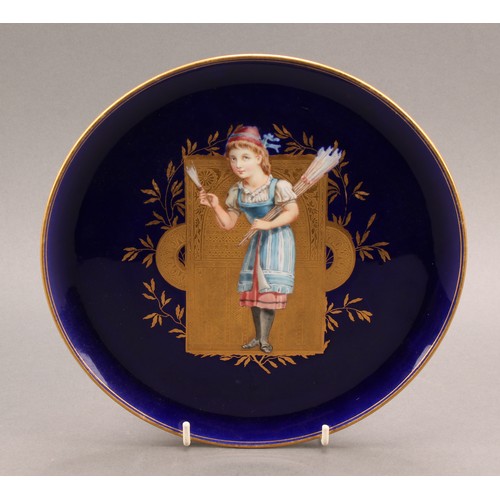 112 - A Wedgwood Aesthetic Movement porcelain pedestal comport, painted with a peasant girl with feathered... 