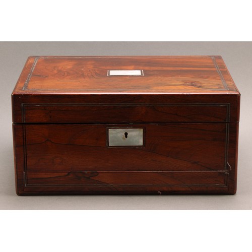 2437 - A Victorian rosewood rectangular dressing box, hinged cover enclosing a fitted interior with bottles... 