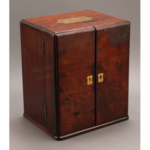 1965 - Medical Interest - a George III mahogany apothecary cabinet, flush brass campaign type handle above ... 