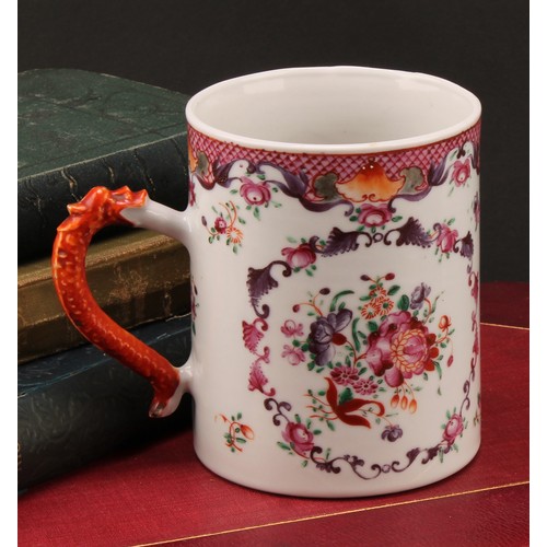 1369 - An 18th century Chinese cylindrical mug, painted in the famille rose palette with flowers, dragon ha... 