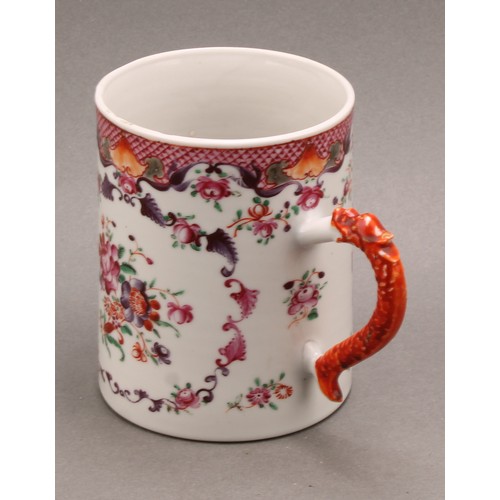 1369 - An 18th century Chinese cylindrical mug, painted in the famille rose palette with flowers, dragon ha... 