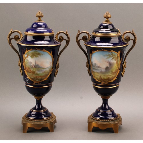 244 - A pair of 19th century Sèvres style ormolu mounted pedestal vases and covers, Louis XV in taste, app... 