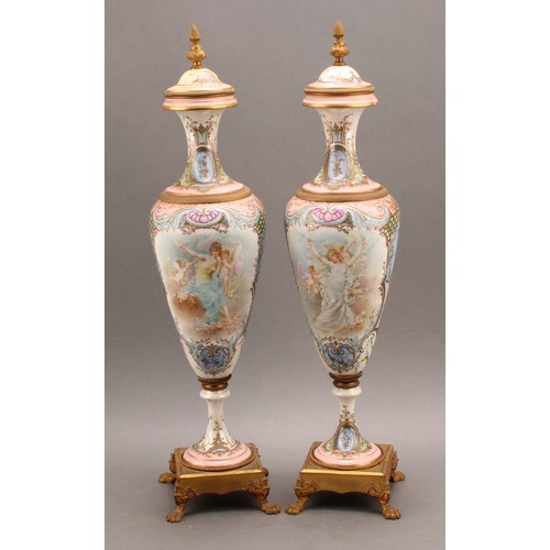 245 - A pair of 19th century Sèvres style ormolu mounted slender pedestal vases and covers, applied with t... 