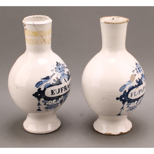 27 - A pair of 18th century Delft drug or pharmacy jars, footed void form with cylindrical collars, paint... 