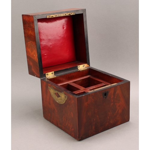 2331 - A George III mahogany flame-veneered decanter box, the cover with cushion lined interior and enclosi... 