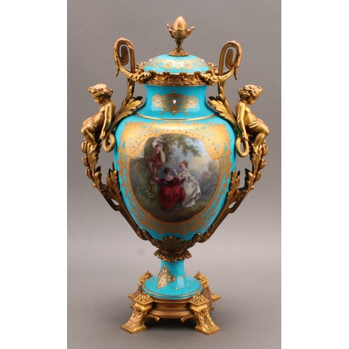 218 - A 19th century Sèvres style ormolu mounted pedestal vase and cover, applied with a tooled gilt carto... 