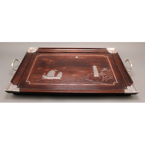 720 - A Chinese silver and hardwood rectangular serving tray, inlaid with a junk and a pagoda, 61.5cm over... 