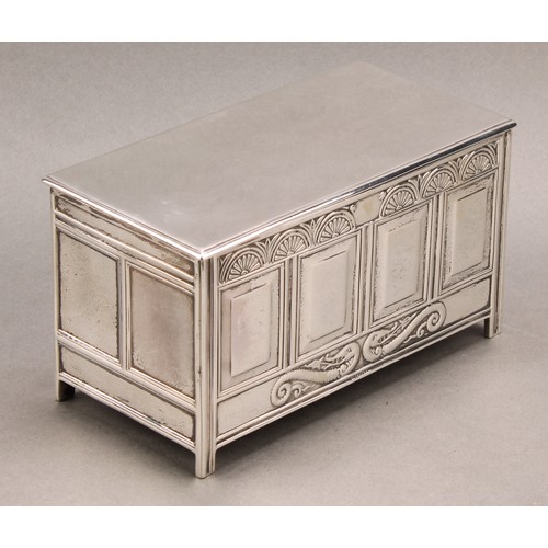 814 - A George V silver novelty cigarette box, as a Charles II blanket chest, hinged cover, oak-lined twin... 