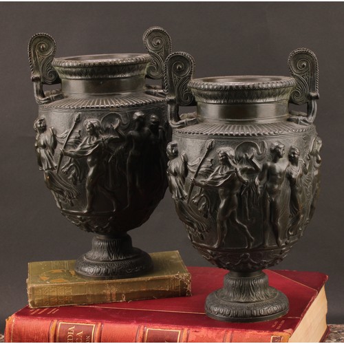 2401 - A pair of neoclassical patinated bronze kraters or vases, after the Charles Townley vase, cast in hi... 