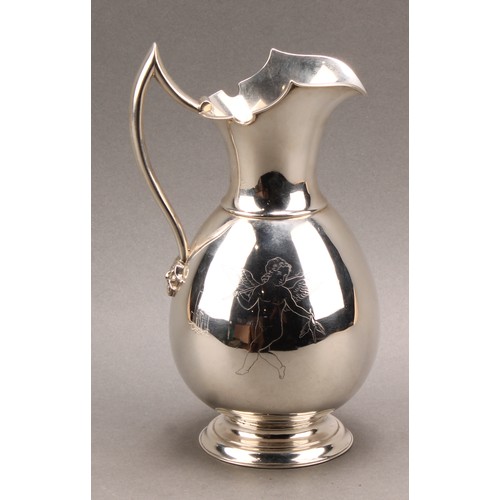 741 - A Danish silver ovoid wine jug, engraved Cupid, angular scroll handle terminating in a Bacchic mask,... 