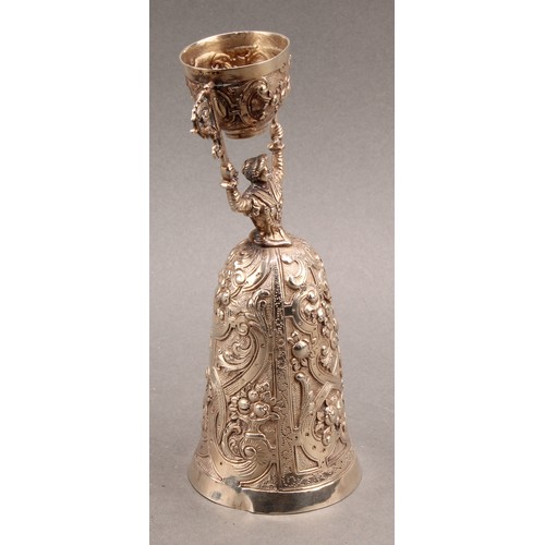 739 - A Continental silver wager cup, of typical Renaissance figural design, chased with flowers and strap... 