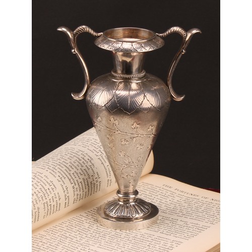 1009 - An early 20th century silver coloured metal vase, of substantial gauge and possibly American, chased... 