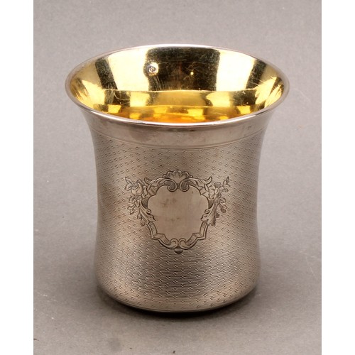 746 - A French silver bell shaped beaker, engine turned, gilt interior, 7cm high, 19th century, 96g