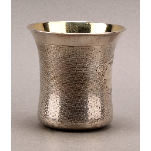 746 - A French silver bell shaped beaker, engine turned, gilt interior, 7cm high, 19th century, 96g