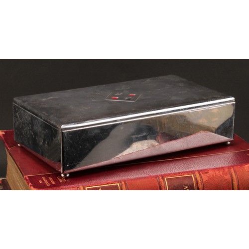 2564 - An Art Deco chrome rectangular bridge box, hinged cover decorated in tones of black and red with the... 