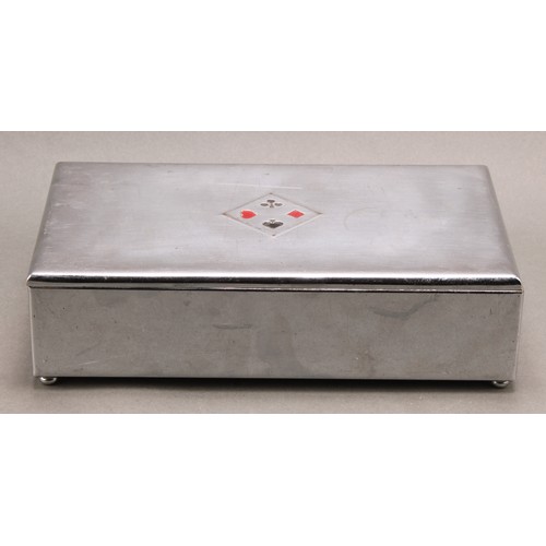 2564 - An Art Deco chrome rectangular bridge box, hinged cover decorated in tones of black and red with the... 