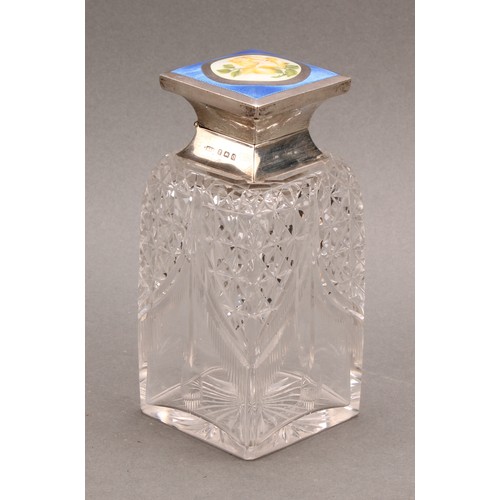 806 - A George V silver and enamel mounted square scent bottle, hinged cover decorated with a yellow rose ... 