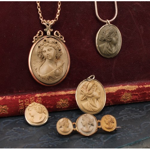 1227 - A selection of Lava Cameo Jewellery
To include; a Victorian lava cameo pendant necklace, Flora with ... 