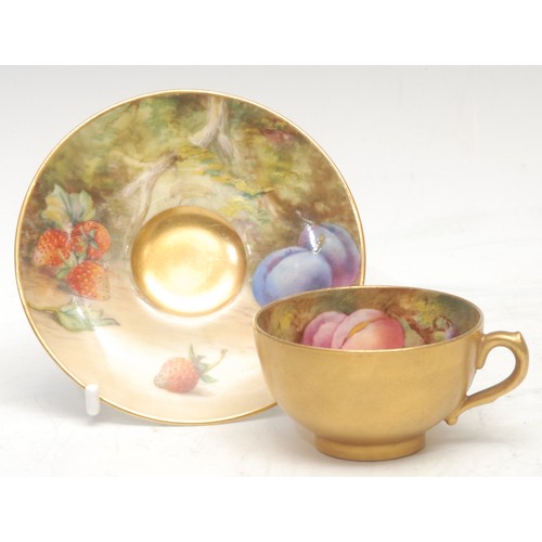 139 - A Royal Worcester cabinet cup and saucer, painted by Cole and Austin, signed, with ripening fruit on... 