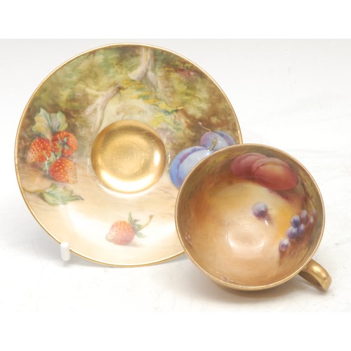 139 - A Royal Worcester cabinet cup and saucer, painted by Cole and Austin, signed, with ripening fruit on... 