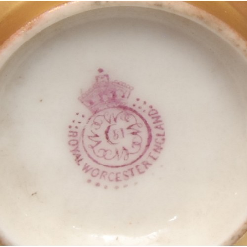 139 - A Royal Worcester cabinet cup and saucer, painted by Cole and Austin, signed, with ripening fruit on... 