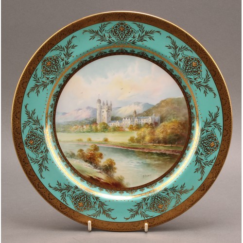 85 - A Minton named view circular plate, painted by A. Holland, with a view of Balmoral Castle, under a j... 