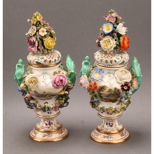 92 - A pair of Coalbrookdale Rococo Revival porcelain pot pourri pedestal vases, painted with flowers and... 