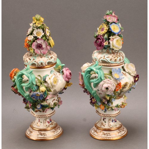 92 - A pair of Coalbrookdale Rococo Revival porcelain pot pourri pedestal vases, painted with flowers and... 