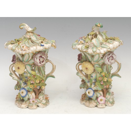 186 - A pair of Bloor Derby porcelain pot pourri vases and covers, each asymmetrical vase encrusted with c... 