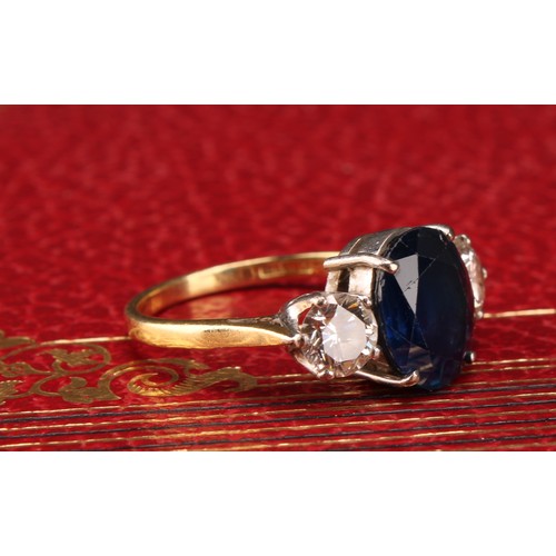 1173 - 18ct yellow gold Sapphire and Diamond Trilogy Ring
The ring is set with an approx. 4.59ct oval brill... 